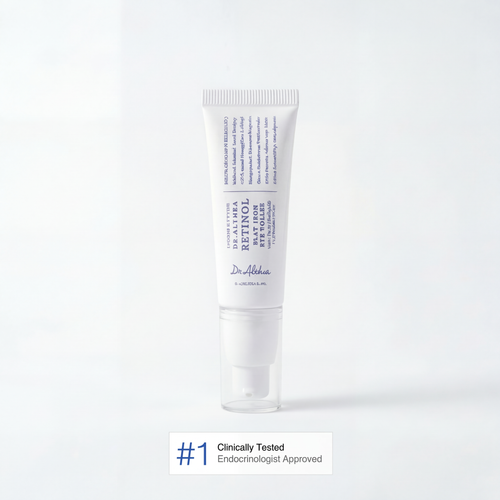 Flat iron eye roller applicator close-up with liquid serum

Eye serum tube with precision flat metal roller tip

Under-eye retinol gel with ergonomic cooling applicator